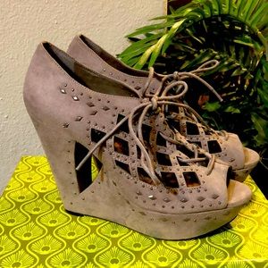 Gray platforms with beaded accents